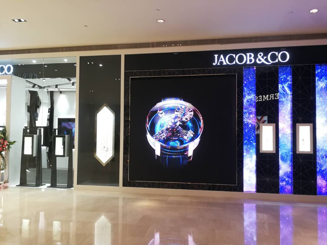 LED screen installation with an interactive feature, allowing customers to explore the brand