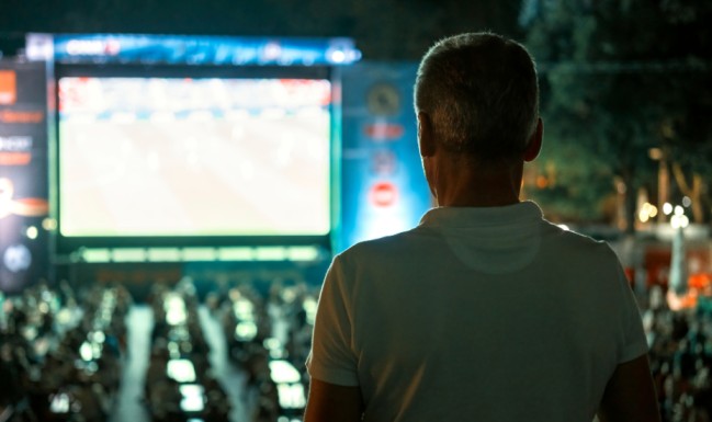 A man watching Football At LED Displays