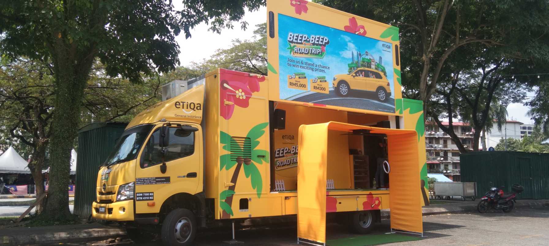 Etiqa booth using outdoor digital advertising truck at public space