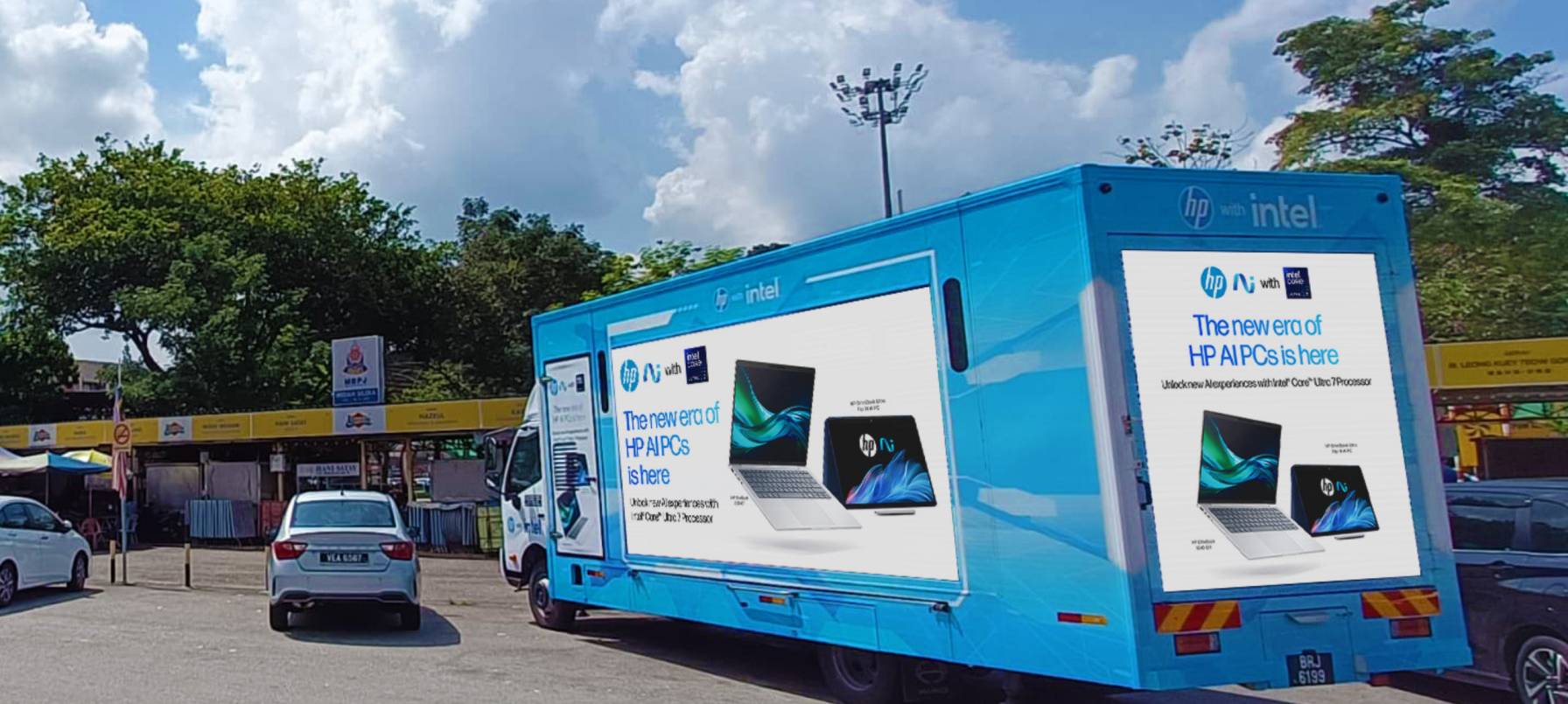 HP truck-mounted LED screens at a public spot