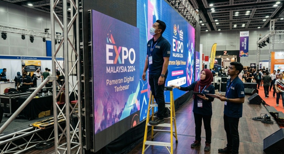 Workers finding a way to measure an LED screen size
